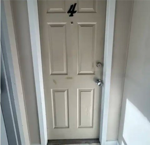 A white door with the number 42 on it.